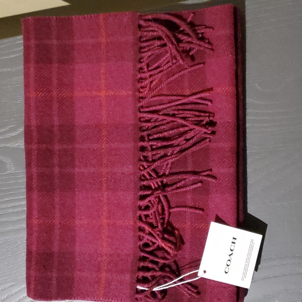 Coach scarf. Bright violet plaid reversible with Coach design on other side.